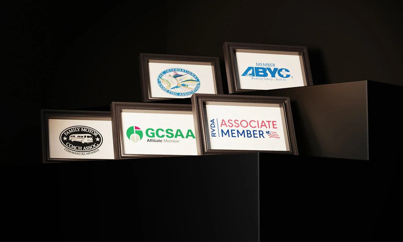 A display of framed industry certifications like RVIA and ABYC, representing LiTime's expert-backed quality