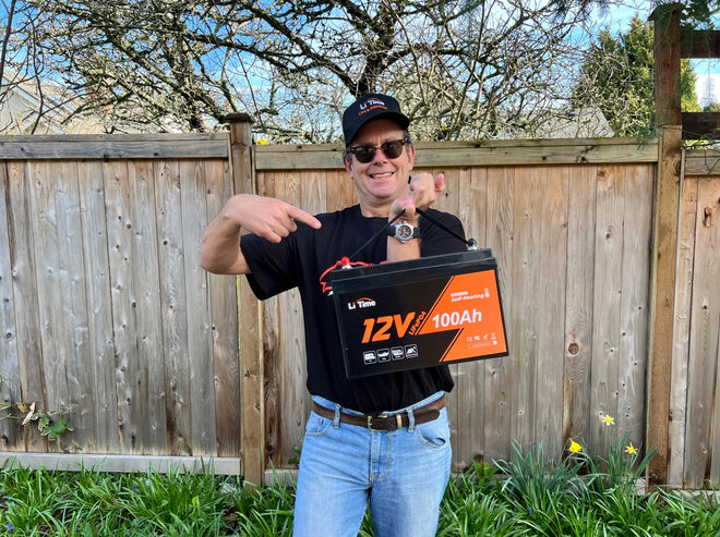 a man holds a litime battery representing LiTime's sponsorship of community events